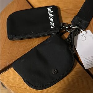 lululemon athletica Black hand size Wallet/Bag with wrist strap.